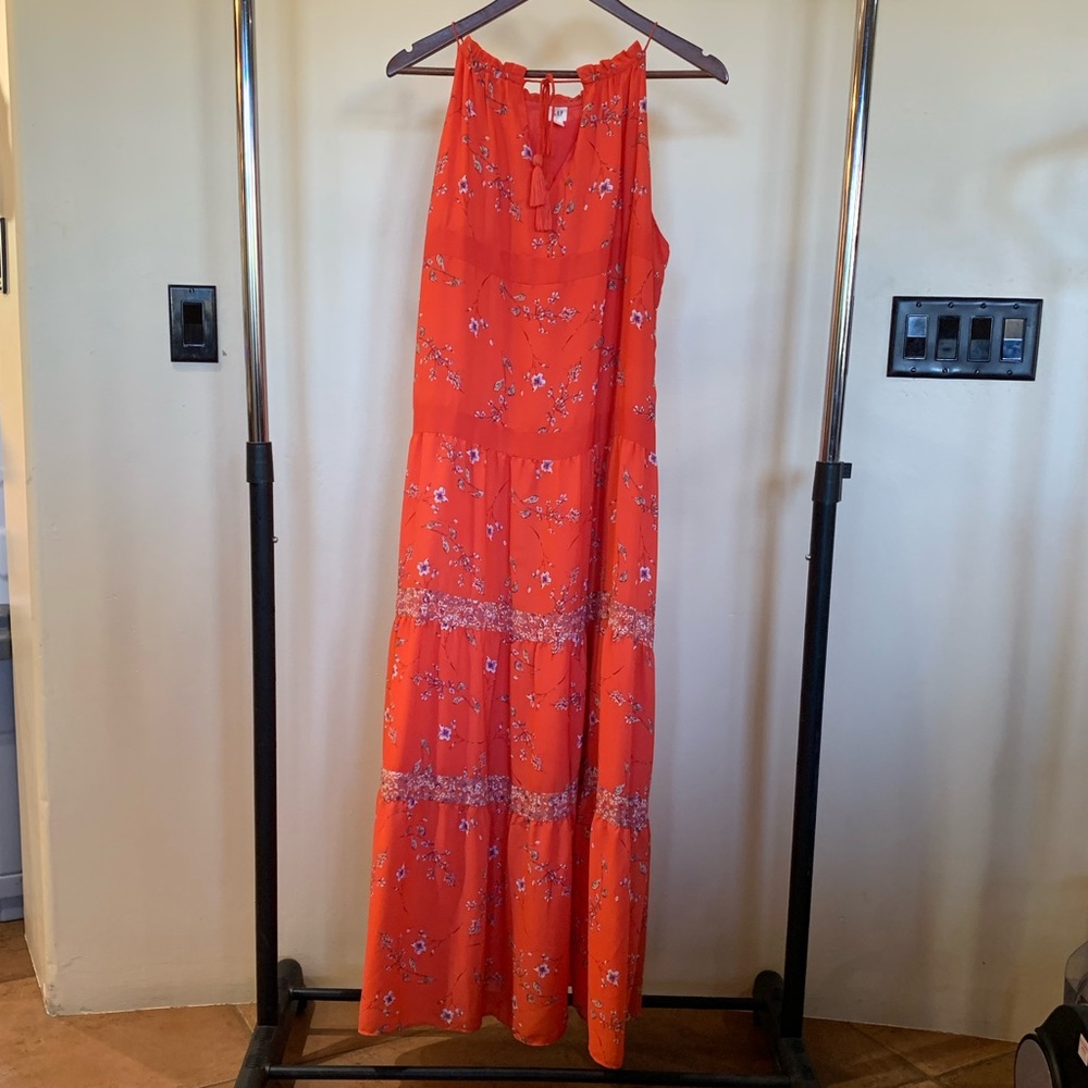 Red-orange floral, floor-length dress with pockets